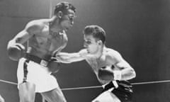 Jake Lamotta Misses Punch<br>(Original Caption) 2/14/1951-Chicago, IL: This first round action shows La Motta missing a strong right to the mid-section of Robinson.