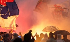 Protesters set off flares during a protest against the Mirëdita, Dobar Dan art festival in Belgrade. 