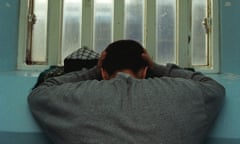 Young inmate looking depressed in prison cell, Portland Young Offenders Institution, Portland, Dorset, United Kingdom.<br>ABC98D Young inmate looking depressed in prison cell, Portland Young Offenders Institution, Portland, Dorset, United Kingdom.