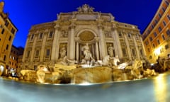 The Trevi fountain in Rome at night.