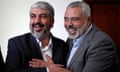 Hamas chief Khaled Meshaal hugs senior Hamas leader Ismail Haniyeh in late 2012.