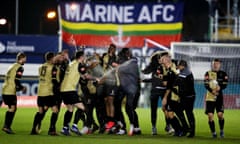 Marine celebrate after beating Havant and Waterlooville to reach the third round for the first time in the club’s history.