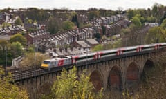 A Virgin east coast mainline train crossing Durham viaduct