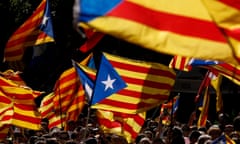 People wave 'Esteladas' (pro-independence Catalan flags) as they gather during a pro-independence demonstration, on September 11, 2017 in Barcelona during the National Day of Catalonia, the 'Diada.'
Hundreds of thousands of Catalans were expected to rally to demand their region break away from Spain, in a show of strength three weeks ahead of a secession referendum banned by Madrid. The protest coincides with Catalonia's national day, the 'Diada,' which commemorates the fall of Barcelona in the War of the Spanish Succession in 1714 and the region's subsequent loss of institutions and freedoms.
 / AFP PHOTO / PAU BARRENAPAU BARRENA/AFP/Getty Images