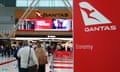 People arrive at the Qantas domestic terminal at Sydney airport