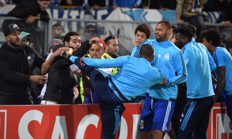 Patrice Evra appears to kick Marseille fan before match – video