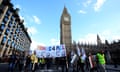 Protestors march to Downing Street to demonstrate against the housing bill.