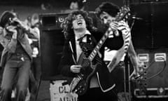 Angus Young and Bon Scott in AC/DC in 1970s.