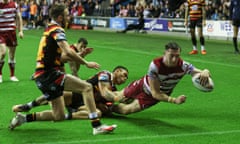 Jake Wardle scores for Wigan during their dominant victory over Salford