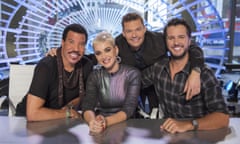 This image released by ABC shows, from left, Lionel Richie, Katy Perry, Ryan Seacrest and Luke Bryan in New York. Richie, Perry and Bryan are the judges on the next season of "American Idol," premiering March 11 on ABC. (Eric Liebowitz/ABC via AP)
