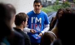 A campaigner hands out leaflets for Britain Stronger in Europe, at Waterloo station in London.