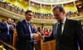 Spain's new Prime Minister and Socialist party (PSOE) leader Pedro Sanchez shakes hands with ousted Prime Minister Mariano Rajoy after a motion of no confidence vote at parliament in Madrid, Spain, June 1, 2018.   Pierre-Philippe Marcou/Pool via REUTERS