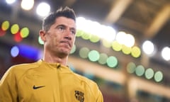 Robert Lewandowski prepares to warm up before the match at Mallorca, in which he scored the only goal of the game