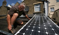 Solar panels being installed on the roof of a house in South East London.