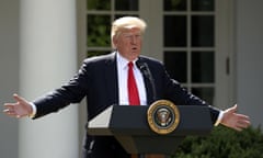 FILE - In this June 1, 2017, file photo, President Donald Trump speaks about the U.S. role in the Paris climate change accord in the Rose Garden of the White House in Washington. A new poll finds that less than a third of Americans support Trump’s decision to withdraw from the Paris climate accord, with just 18 percent of respondents agreeing with his claim that pulling out of the international agreement to reduce carbon emissions will help the U.S. economy.(AP Photo/Andrew Harnik, File)