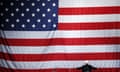 Republican presidential candidate Donald Trump turns to the American flag at a campaign rally in Sterling Heights, Mich., on Nov. 6, 2016