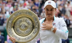 Ash Barty poses with the 2021 Wimbledon trophy in 2021