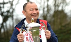 Eddie Jones poses with the Six Nations trophy