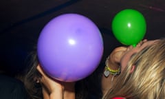 Balloons of nitrous oxide are consumed at a party