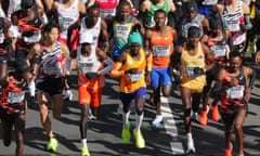 Benson Kipruto (second right) and his compatriot Timothy Kiplagat (centre) start the Tokyo Marathon. Eliud Kipchoge is third from the left. 