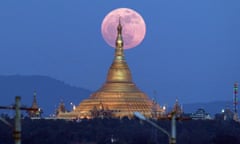 The supermoon rises behind the Uppatasanti Pagoda Naypyitaw, Myanmar