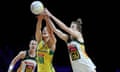 Liz Watson of Australia and Karla Pretorius battle for possession.