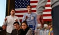 The Good Liars, Davram Stiefler, left, and Jason Selvig, listen as Republican presidential candidate Jeb Bush spoke to supporters at the Embassy Suites in Des Moines, on Monday 1 February 2016.