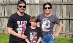 Kyle Adcock, left, stands with Amy Drouillard and her son Nolan, whom he is seeking to adopt after she died from cancer a short time after their hospital wedding.