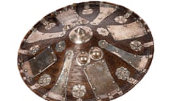 circular 19th-century shield with decorative metal plates and detailing