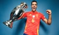 Mikel Merino poses with the Henri Delaunay trophy after the Euro 2024 final between Spain and England