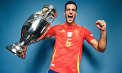 Mikel Merino poses with the Henri Delaunay trophy after the Euro 2024 final between Spain and England