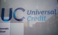 Universal credit sign on an automatic door