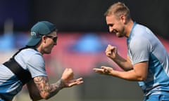 Liam Livingstone (right) plays rock, paper, scissors with Brydon Carse during a practise session in India.