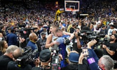 Nikola Jokić celebrates with his family after winning the  NBA finals