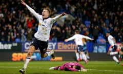 Bolton celebrate their last-gasp winner, while it’s all too much for Scunthorpe goalkeeper Luke Daniels.