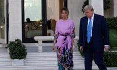 Republican presidential candidate, former US President Donald Trump and former first lady Melania Trump arrive at the home of billionaire investor John Paulson on April 6, 2024 in Palm Beach, Florida.