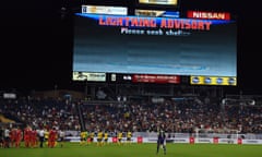 Players were withdrawn from the field because of lightning.