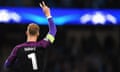 Joe Hart waves to fans as he celebrates at the end of the match, which may have been his last match for Manchester City. 