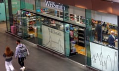 People walk past a WH Smith store in London, Britain, April 16 2023. REUTERS/Peter Nicholls