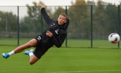Dwight Gayle attempts a flying effort in training