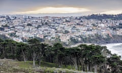 Sea Cliff neighborhood with Baker Beach and Monterey Cypress Trees in winter sunset<br>2AGXXM2 Sea Cliff neighborhood with Baker Beach and Monterey Cypress Trees in winter sunset