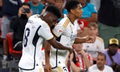 Real Madrid’s Jude Bellingham (right) celebrates scoring on his debut with Aurélien Tchouaméni.