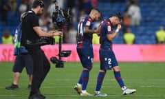 Francisco Gomez alias 'Son' of Levante is consoled by teammate Ruben Vezo after their team were relegated to second division