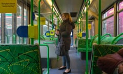 A passenger on a nearly empty Melbourne tram on Friday