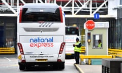 National Express coach departing from the depot.