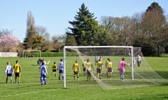 Boys' football match at Abbeyfields recreation ground in Chertsey, Surrey, England