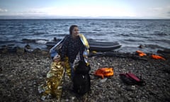 A Syrian refugee woman and child arriving on Lesbos, Greece from Turkey.