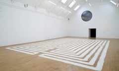 Richard Long’s Walking a Labyrinth, 1971/2016 at Modern Art Oxford, beneath the graphite disc of Mohammed Qasim Ashfaq’s Mass I.