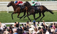  Khaadem (right) chases down Sacred to win the Queen Elizabeth II Jubilee Stakes.