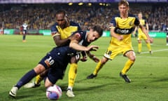 Brian Kaltak of the Central Coast Mariners tackles Bruno Fornaroli of Melbourne Victory during the A-League Men Grand Final in Gosford